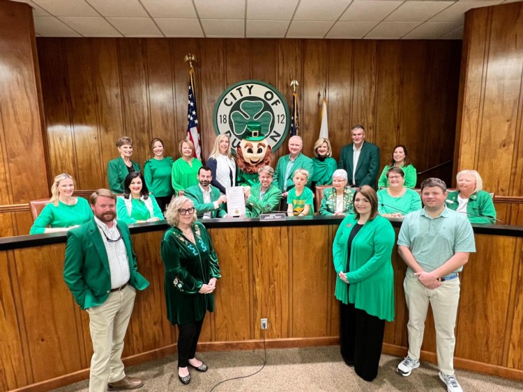 Group of Members in Green with the Mayor