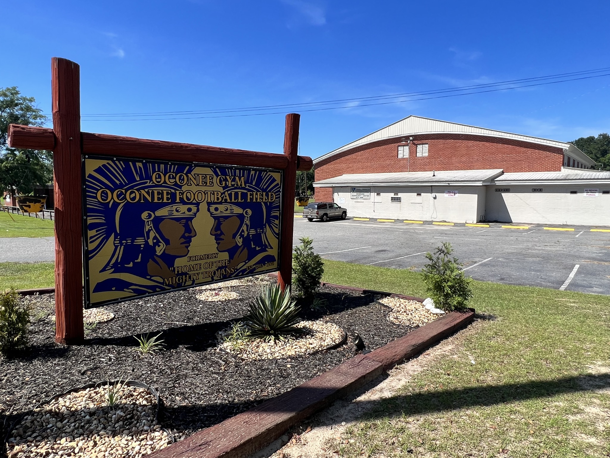 The school sign and gym